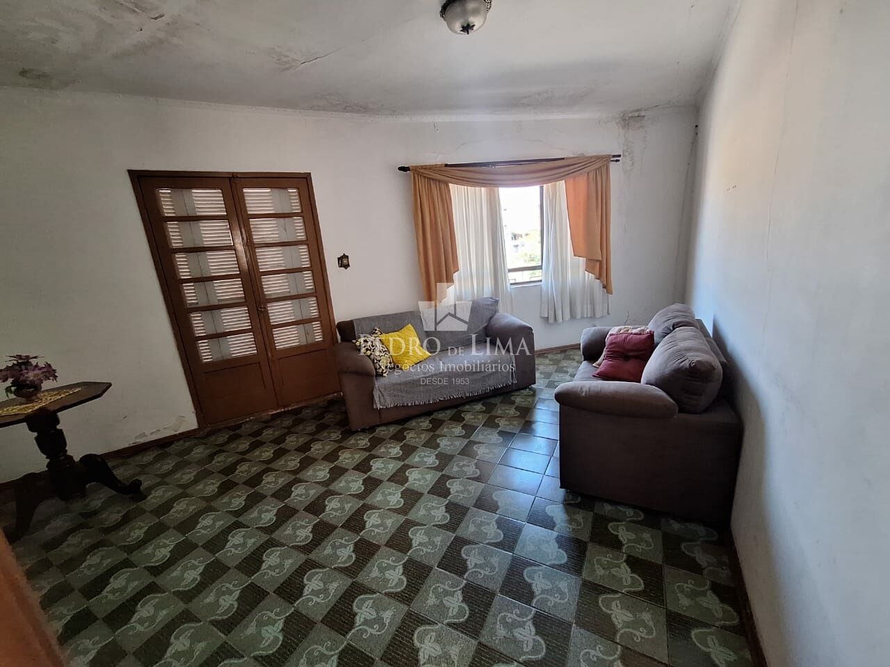 Salão comercial com 3 casas residenciais na Penha