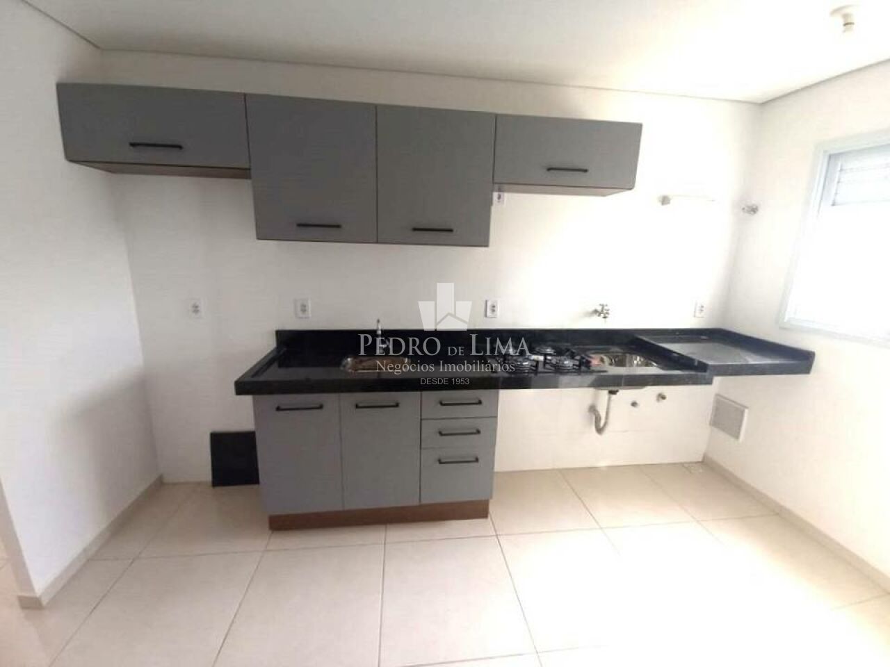 Apartamento de 57 metros na Penha de França, com dois quartos.