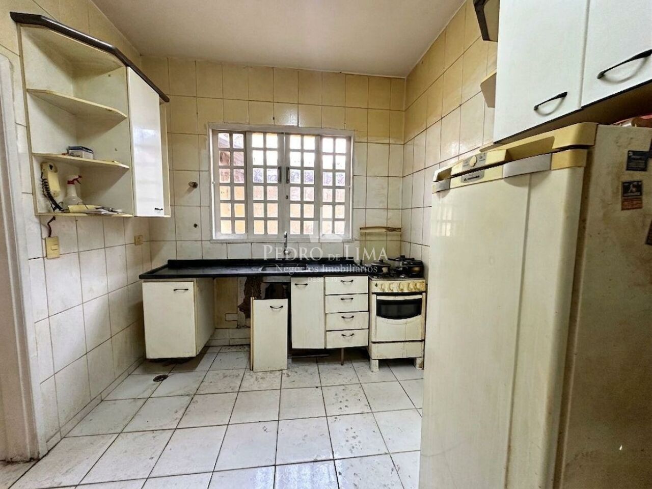Casa Térrea 2 dormitórios, corredor lateral, quintal e 2 vagas na Penha