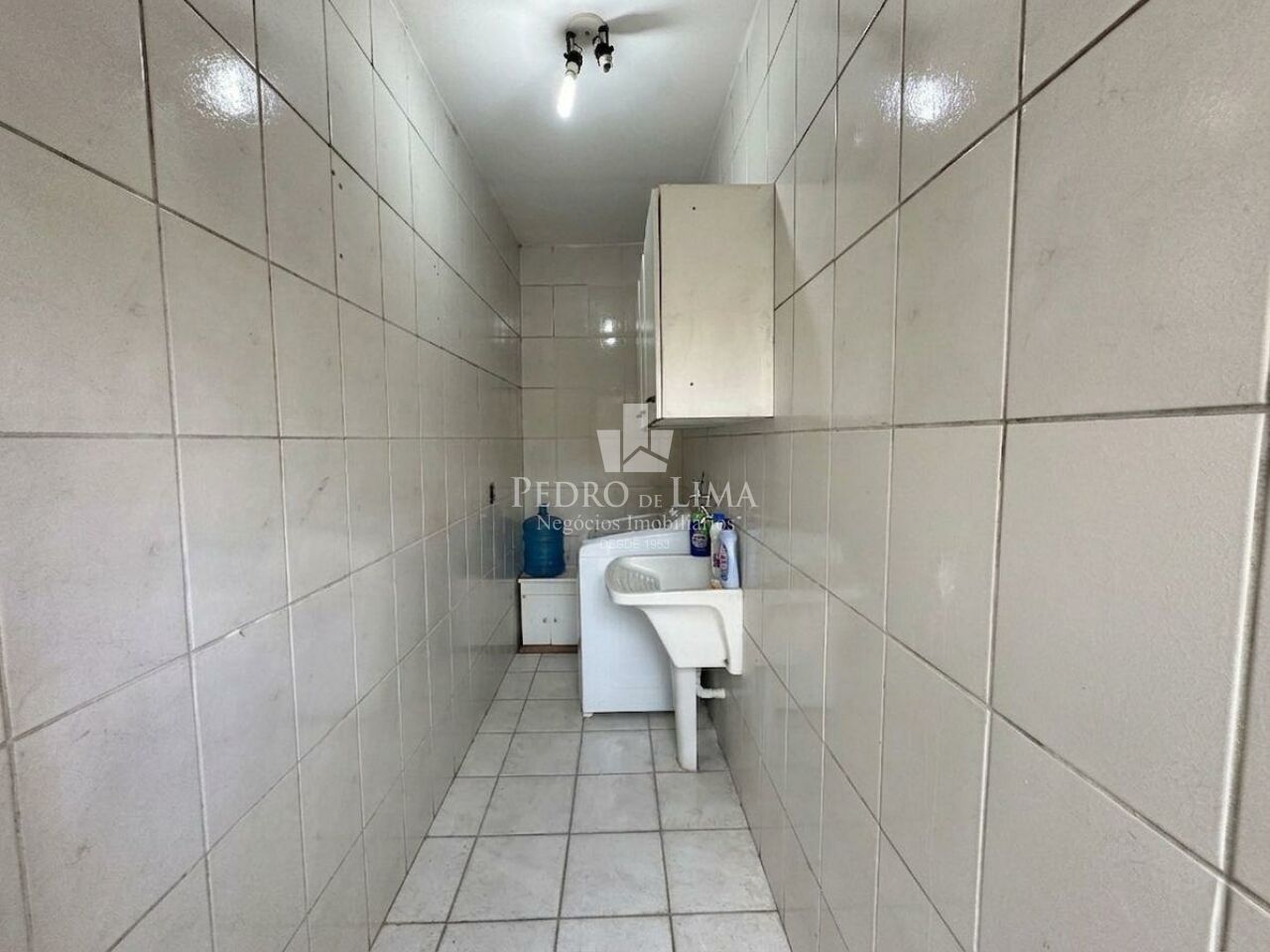Casa Térrea 2 dormitórios, corredor lateral, quintal e 2 vagas na Penha