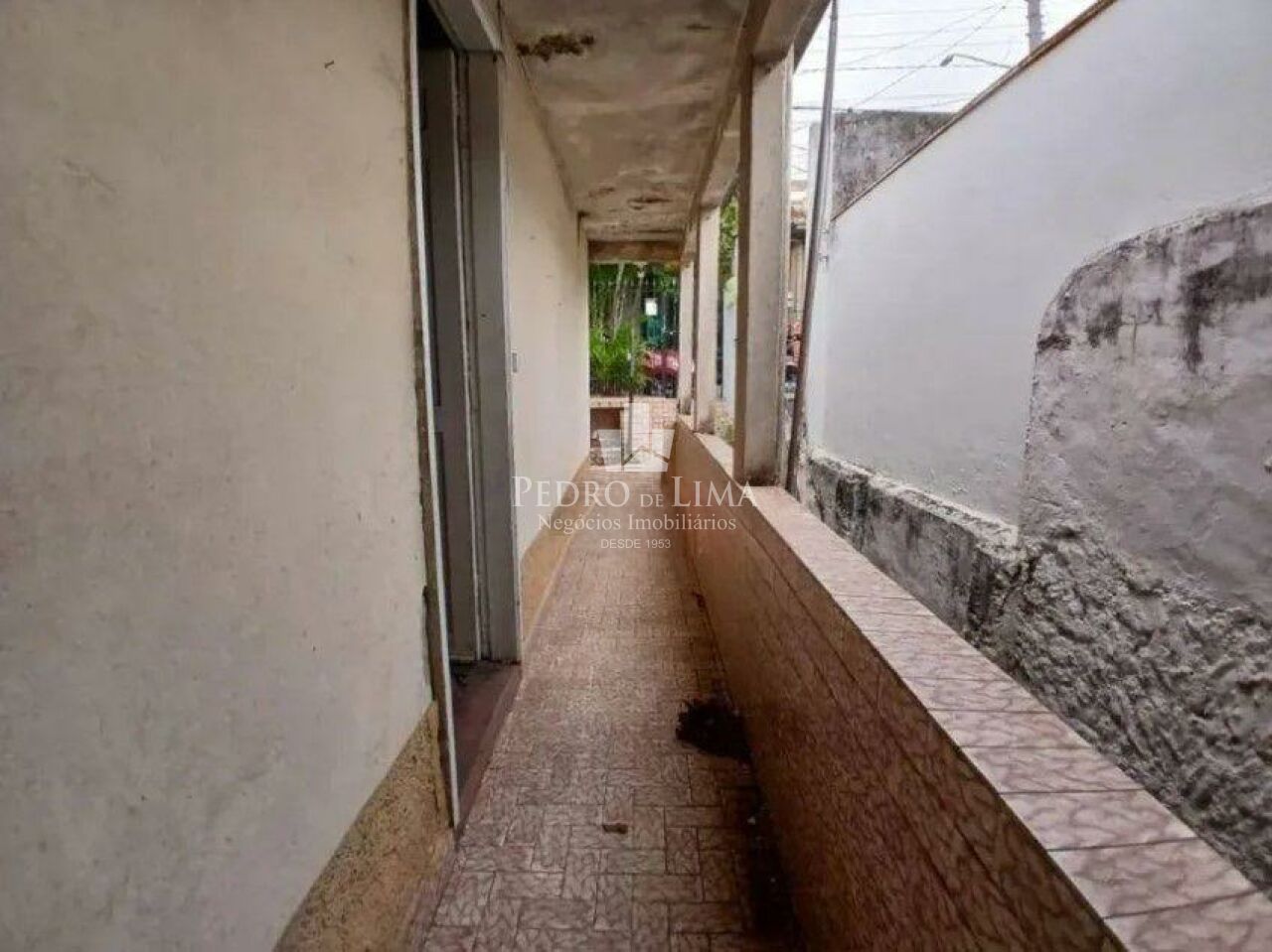 Terreno, medindo 7,80x20 em declive na Penha