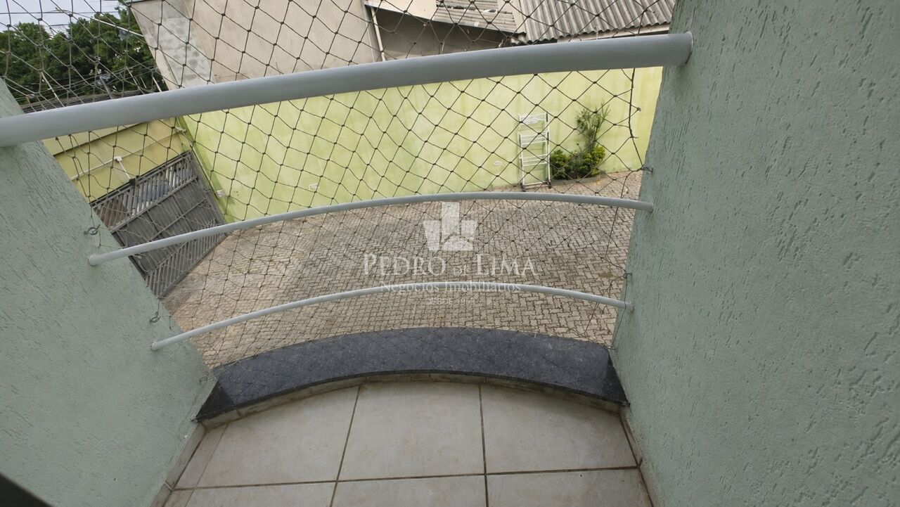 Sobrado em condomínio fechado com 60 m², 2 quartos e vaga na Vila Ré.