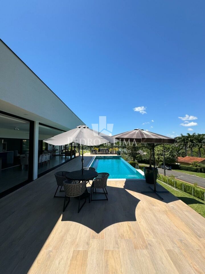 imagem do imovel Casa Térrea com 4 suítes, 4 vagas e piscina no condomínio Jardim das Palmeiras Bragança Paulista-SP ref: TP26185