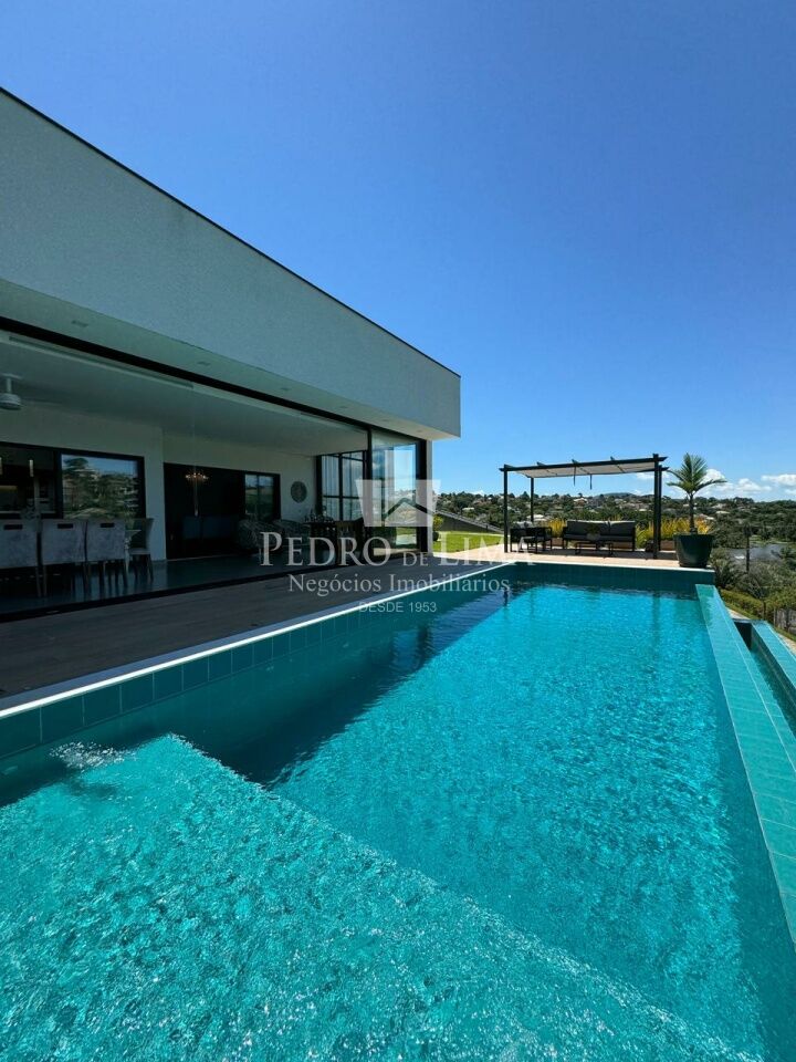 imagem do imovel Casa Térrea com 4 suítes, 4 vagas e piscina no condomínio Jardim das Palmeiras Bragança Paulista-SP ref: TP26185