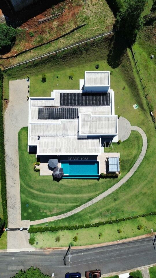Casa Térrea com 4 suítes, 4 vagas e piscina no condomínio Jardim das Palmeiras Bragança Paulista-SP