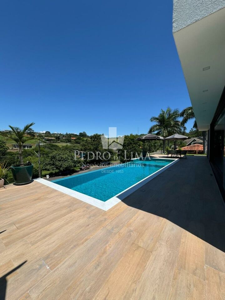 imagem do imovel Casa Térrea com 4 suítes, 4 vagas e piscina no condomínio Jardim das Palmeiras Bragança Paulista-SP ref: TP26185