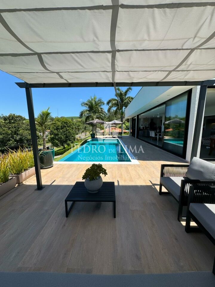 Casa Térrea com 4 suítes, 4 vagas e piscina no condomínio Jardim das Palmeiras Bragança Paulista-SP