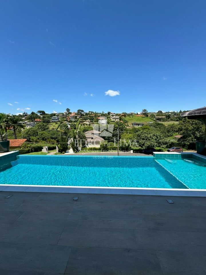 imagem do imovel Casa Térrea com 4 suítes, 4 vagas e piscina no condomínio Jardim das Palmeiras Bragança Paulista-SP ref: TP26185