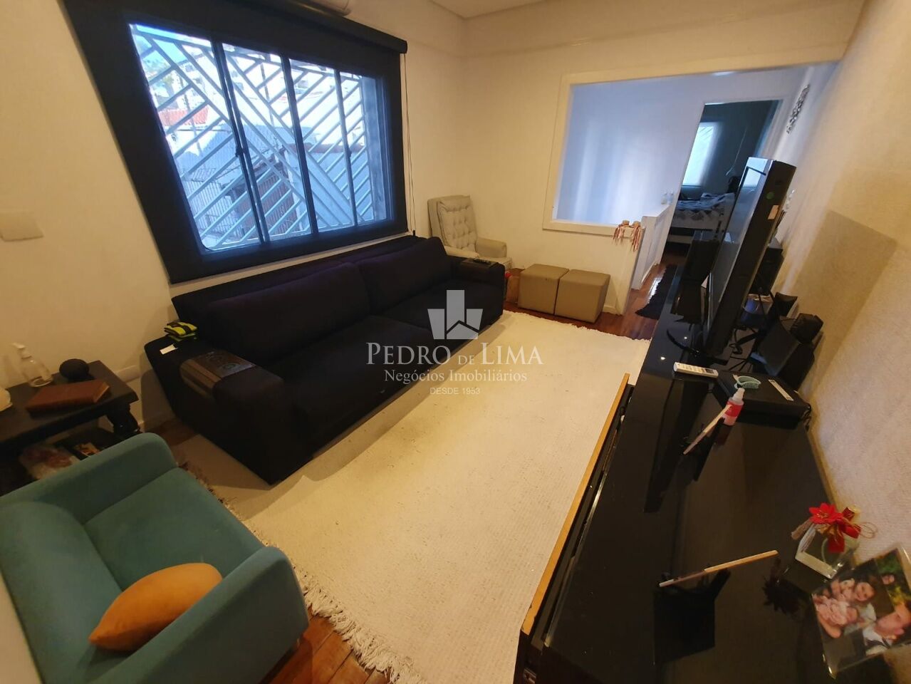 Casa de Vila no Tatuapé com 140m², 3 suítes, área com churrasqueira e forno de pizza.
