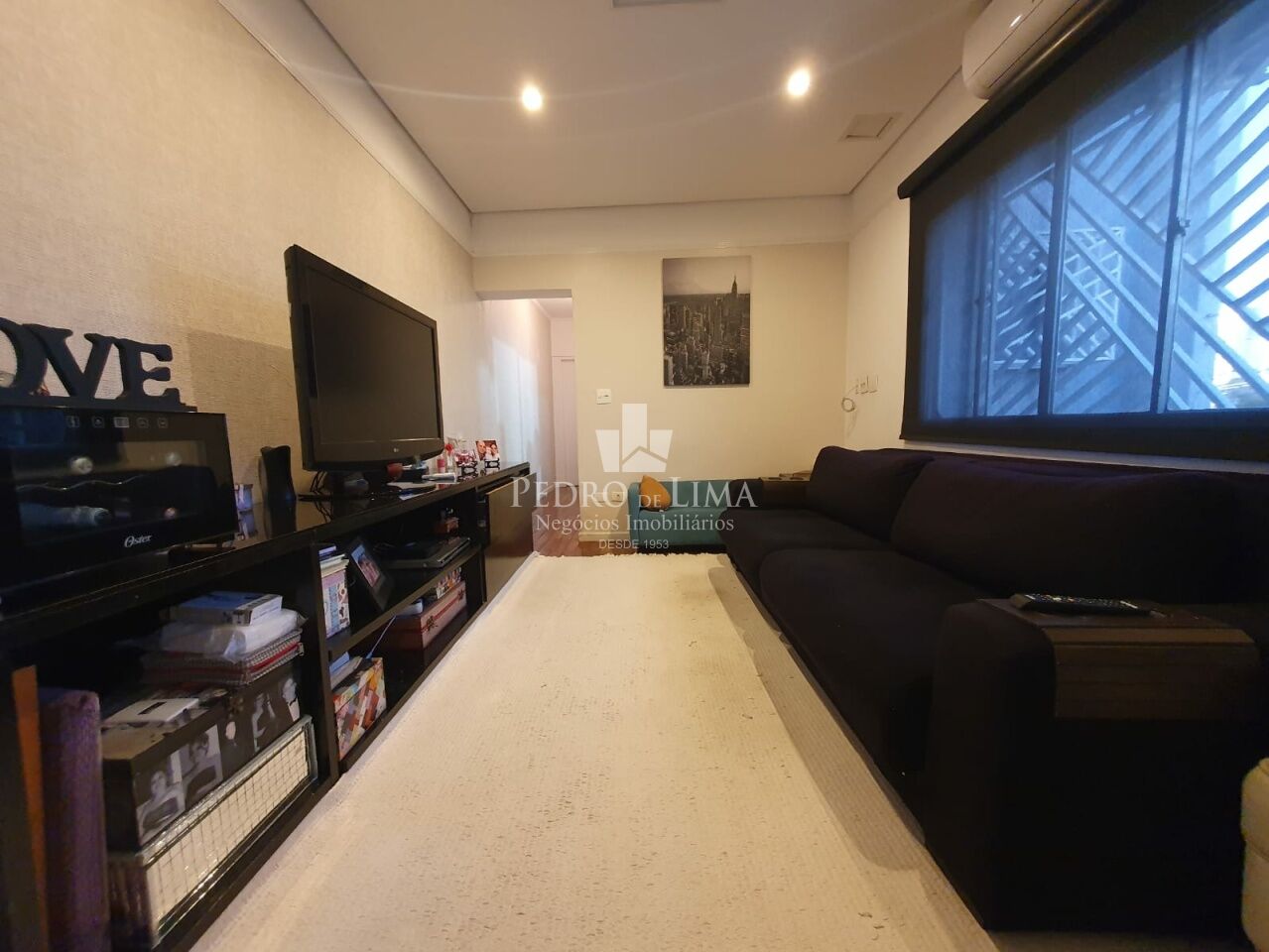 Casa de Vila no Tatuapé com 140m², 3 suítes, área com churrasqueira e forno de pizza.