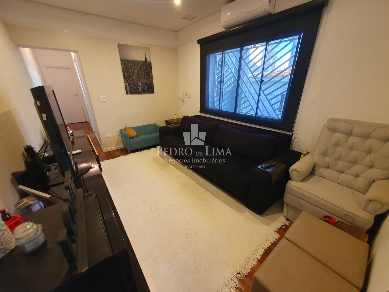 Casa de Vila no Tatuapé com 140m², 3 suítes, área com churrasqueira e forno de pizza.