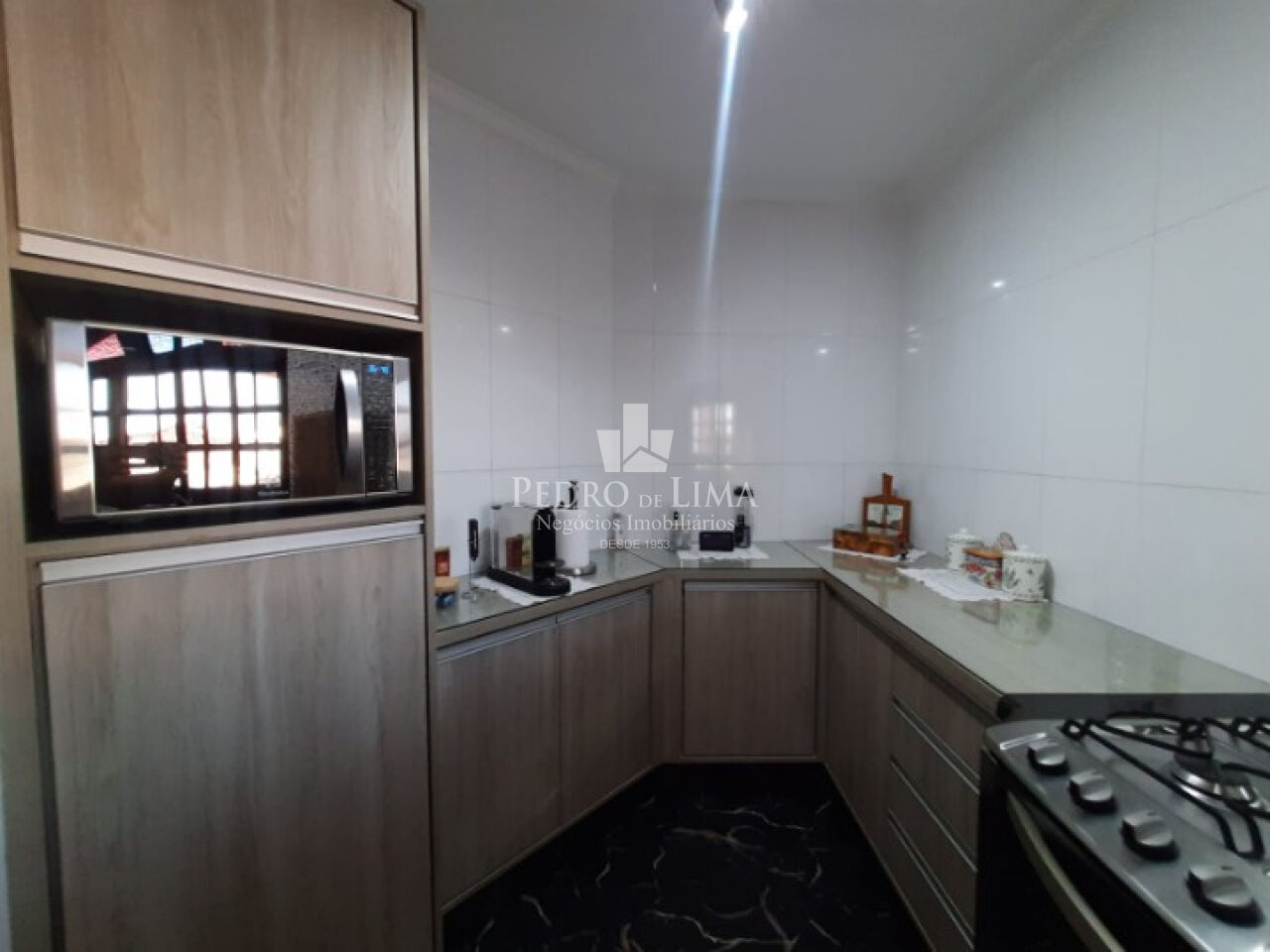 Casa de 4 quartos, 1 suíte, 8 vagas, Salão comercial em Vila Ema