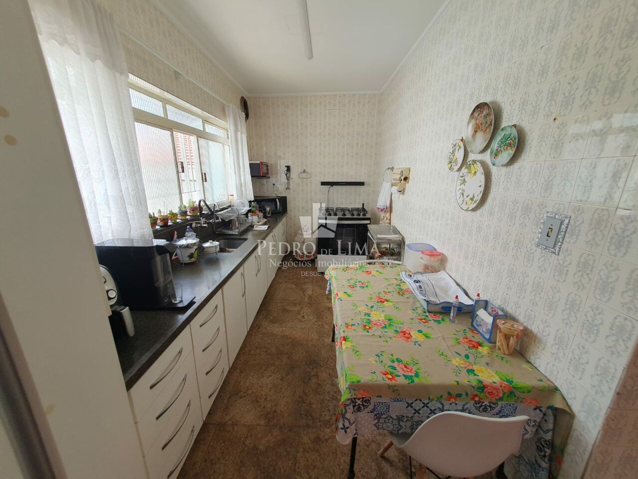 Casa térrea no Tatuapé, para fins comerciais ou residenciais, 414m2 de área construída 