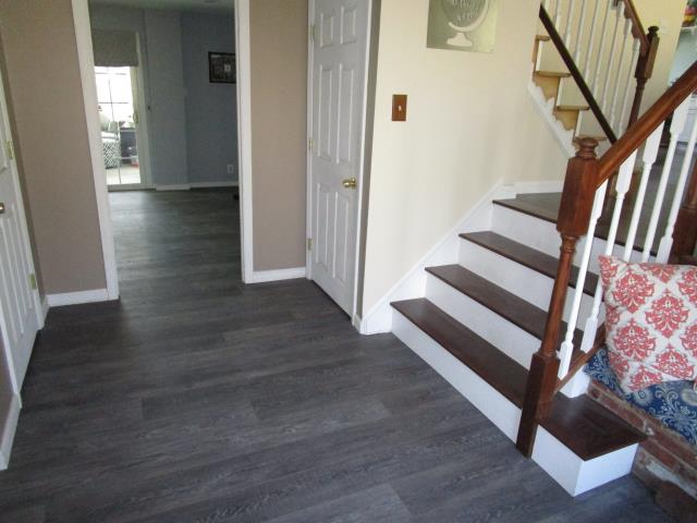 Cherry Hill, NJ - We love our clients! It's a second visit to these folks in Cherry Hill, here you see their entry foyer into the living room, new flooring throughout, love the way it looks against the stained hardwood floors! (We are in process of staining the upper stairs) Cherry Hill, NJ - We love our clients! It's a second visit to these folks in Cherry Hill, here you see their entry foyer into the living room, new flooring throughout, love the way it looks against the stained hardwood floors! (We are in process of staining the upper stairs)