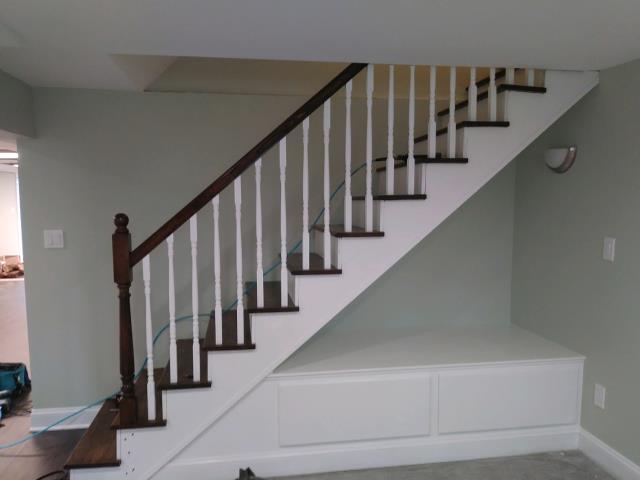 Cherry Hill, NJ - As our Cherry Hill basement job nears completion, some of our carpenters' fabulous work is shining through, like this below-stairs reading nook with extra storage! We've also updated the stairs, treads, risers, and balusters! Cherry Hill, NJ - As our Cherry Hill basement job nears completion, some of our carpenters' fabulous work is shining through, like this below-stairs reading nook with extra storage! We've also updated the stairs, treads, risers, and balusters!