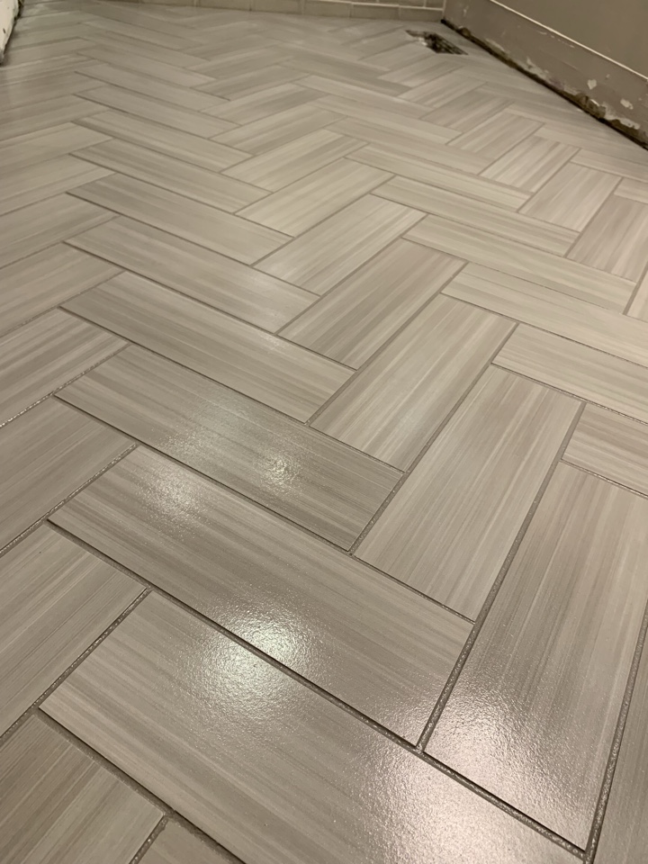 Southampton Township, NJ - Bathroom floor tile in a herringbone pattern. Southampton Township, NJ - Bathroom floor tile in a herringbone pattern.