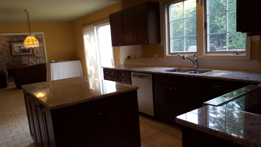Evesham Township, NJ - Almost completed kitchen, new cabinets, counter tops, windows, flooring, sink, faucet and appliances. Evesham Township, NJ - Almost completed kitchen, new cabinets, counter tops, windows, flooring, sink, faucet and appliances.