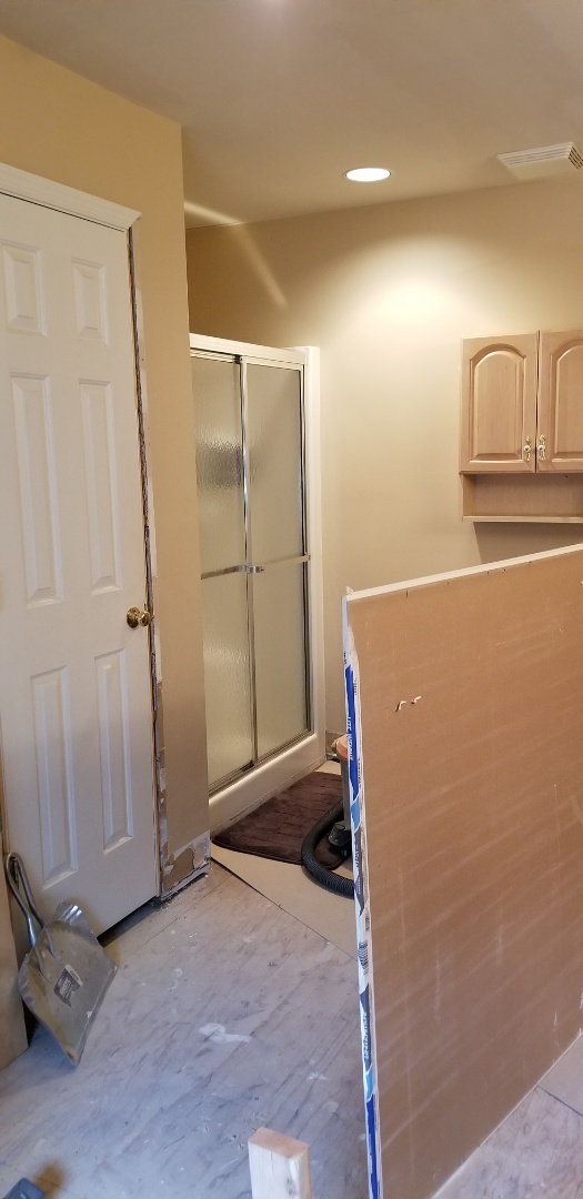 Mount Laurel Township, NJ - Brand new flooring completed and new shower doors added to a bathroom remodel. Mount Laurel Township, NJ - Brand new flooring completed and new shower doors added to a bathroom remodel.