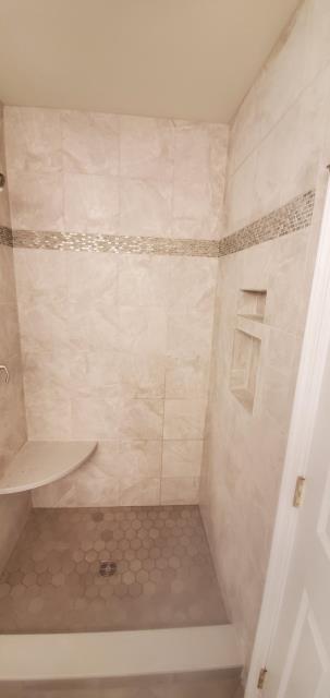 Cherry Hill, NJ - This wonderful family allowed us to do 3 of the bathrooms in there home. It was such a pleasure to work with them. Shower tile was picked perfectly by the homeowner and we installed it, love the floating bench. Cherry Hill, NJ - This wonderful family allowed us to do 3 of the bathrooms in there home. It was such a pleasure to work with them. Shower tile was picked perfectly by the homeowner and we installed it, love the floating bench.