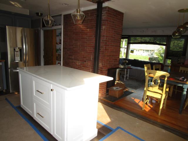 Collingswood, NJ - Halfway mark, floors are protected while cabinets and countertops go in the kitchen Collingswood, NJ - Halfway mark, floors are protected while cabinets and countertops go in the kitchen