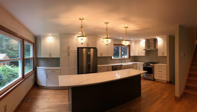 Monroe, NJ - Gutted and remodeled kitchen with new cabinets and layout, new island, new flooring, new backsplash and lighting. Monroe, NJ - Gutted and remodeled kitchen with new cabinets and layout, new island, new flooring, new backsplash and lighting.