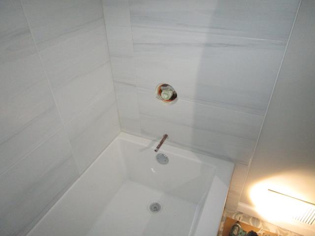 Mount Laurel Township, NJ - In the process of installing a new tub and surround in old bathroom Mount Laurel Township, NJ - In the process of installing a new tub and surround in old bathroom