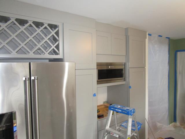 Winslow Township, NJ - Kitchen remodel in the process, brand new gray cabinets with a wine rack above fridge. Can't wait to see the final finish Winslow Township, NJ - Kitchen remodel in the process, brand new gray cabinets with a wine rack above fridge. Can't wait to see the final finish