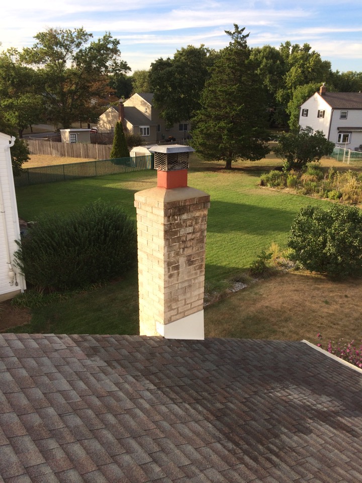 Marlton, NJ - Fixed chimney flu , repointed a few mirror joints , new concrete cap around top of chimney , and dressed up with new counter flashing . Marlton, NJ - Fixed chimney flu , repointed a few mirror joints , new concrete cap around top of chimney , and dressed up with new counter flashing .