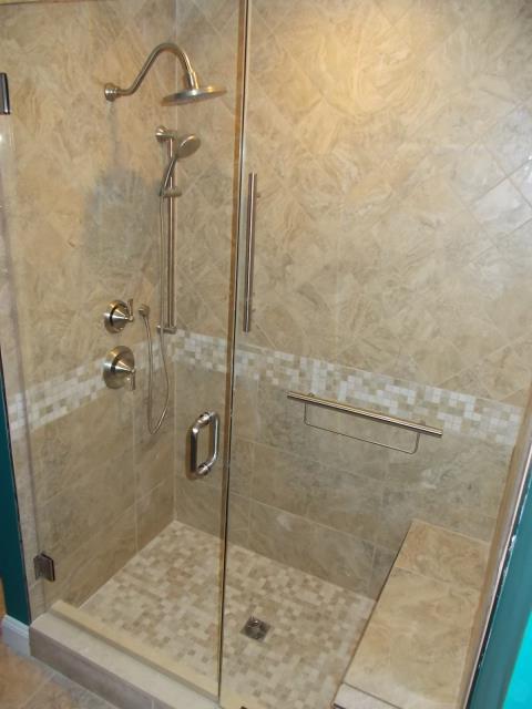 Medford, NJ - Beautiful new shower in one of our Medford bathroom projects. Frameless shower glass, bench, and Moen Wynford fixtures in brushed nickel. Medford, NJ - Beautiful new shower in one of our Medford bathroom projects. Frameless shower glass, bench, and Moen Wynford fixtures in brushed nickel.