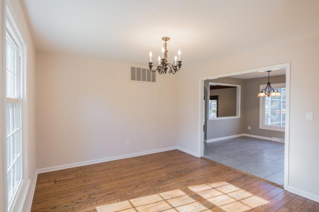 Medford Lakes, NJ - Refinished hardwood floors and 12x24 scale floor tiles dramatically improved the look and flow of this lakefront home. Medford Lakes, NJ - Refinished hardwood floors and 12x24 scale floor tiles dramatically improved the look and flow of this lakefront home.