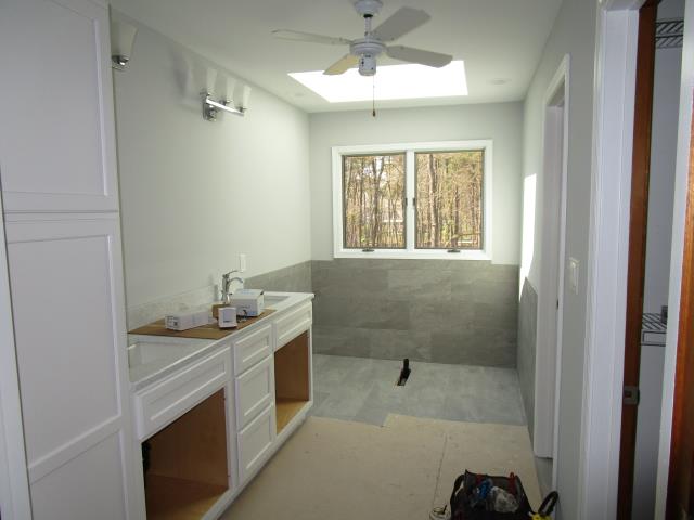 Medford, NJ - Our Highbridge Medford master bathroom remodel is moving right along. Here you can see the soaking tub alcove wainscot has been tiled, along with the floor. The double vanity is set and soon the finishing touches will complete this beautiful bathroom ! Medford, NJ - Our Highbridge Medford master bathroom remodel is moving right along. Here you can see the soaking tub alcove wainscot has been tiled, along with the floor. The double vanity is set and soon the finishing touches will complete this beautiful bathroom !