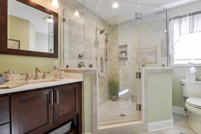 Haddonfield, NJ - Custom niche with grab bars and sliding shower head. This also has a custom shower glass door. Variation of different tile through out with different accent pieces! Haddonfield, NJ - Custom niche with grab bars and sliding shower head. This also has a custom shower glass door. Variation of different tile through out with different accent pieces!
