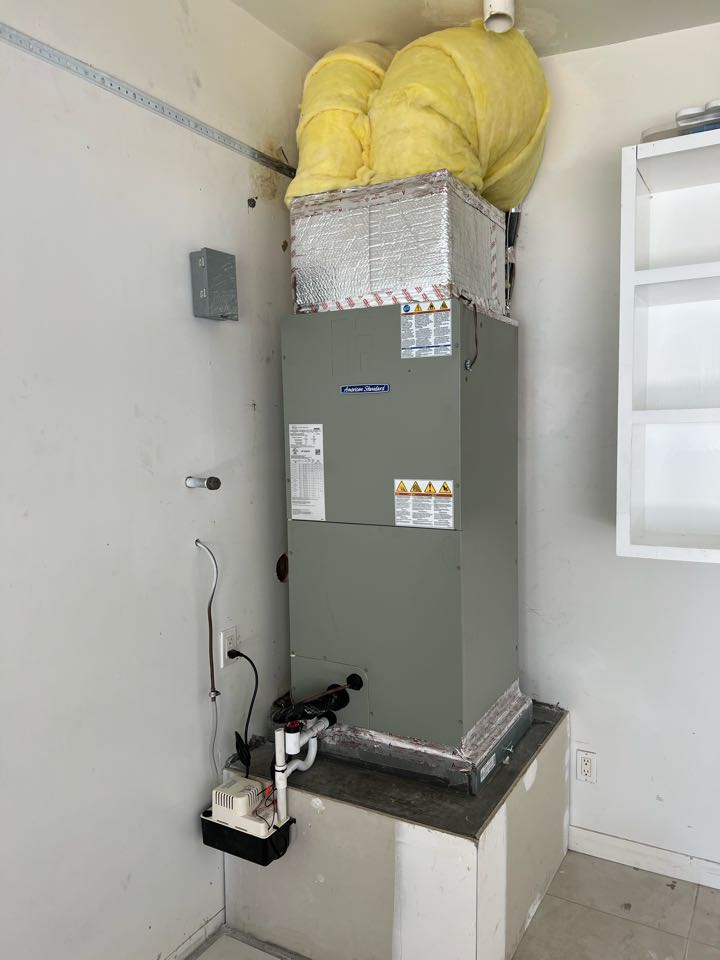 HVAC system installation. Heat pump unit replacement. 