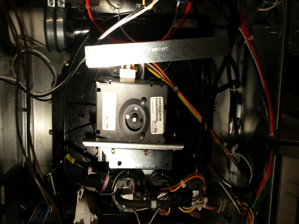 Replace inducer motor on Carrier 58mvb 108 furnace.