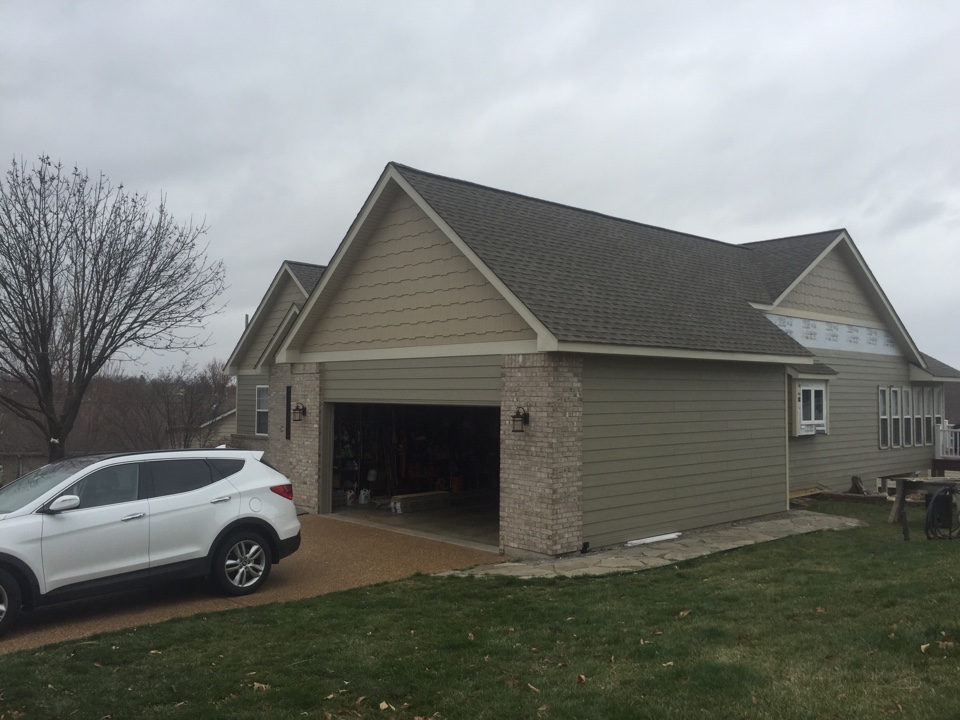 Weldon Spring, MO - LP job in Weldon Springs finishing up. We just have a couple of squares of siding, gutters, and some window wraps to do and she'll be beautiful. Weldon Spring, MO - LP job in Weldon Springs finishing up. We just have a couple of squares of siding, gutters, and some window wraps to do and she'll be beautiful.