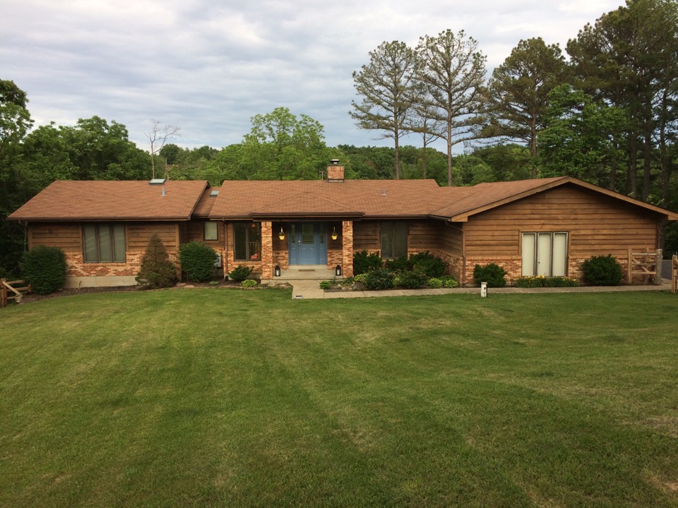 Wildwood, MO - Speaking with a homeowner about foam backed insulated vinyl siding. Wildwood, MO - Speaking with a homeowner about foam backed insulated vinyl siding.