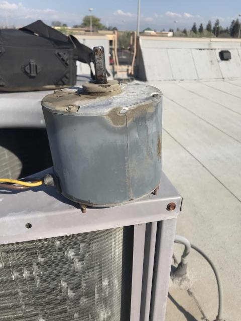 Our Tulare area commercial AC technician returned to a vitamin store to complete approved work. Installed a new condenser fan motor, blade and capacitor on their Carrier package system. Tested and cycled unit after making repairs. System up and running well again.