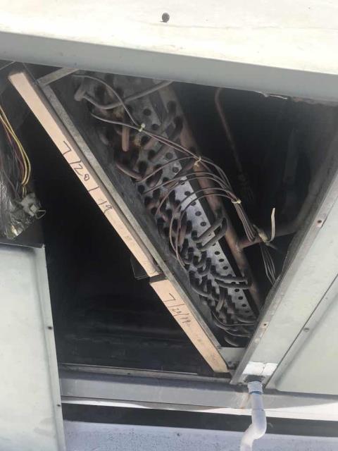 A commercial customer in Arleta California reported that their AC was only blowing hot air. Upon arrival, our technician inspected both systems and found the Rheem air conditioner low on refrigerant with a failed condenser fan motor. Also found the #2 Trane unit with a pitted contactor. Quoting necessary repairs, unit #2 operational only.