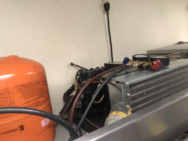 A health food store in Montclair CA reported one of their product freezers had gone down. Our refrigeration tech found that the TXV was frozen over, evap coil and drain pan clear. Replaced the liquid line's schrader core and recharged the unit. System dropped back down to -3 and continues to fall. System operational again.