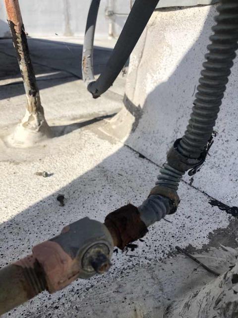 A shopping center in Ventura, California, reported that two sections of the building were not heating. Upon arrival, our technician found two commercial HVAC systems with issues. One EGCL system the thermostat programmed incorrectly, and the tech was able to resolve onsite. He also found a separate Lennox package AC with a deteriorated gas flex connector. The main gas meter was also turned off and locked out by the gas company. The customer will need to address the locked meter issue directly with the gas company, and we will quote replacement of the deteriorated flex connector in the mean time.