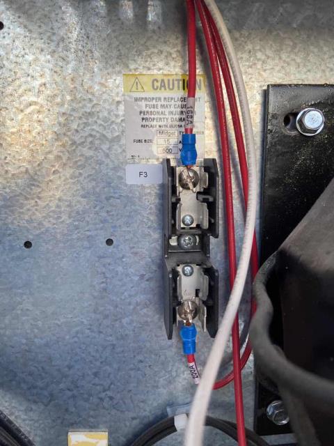 Returned to a grocery store in Apple Valley, California, to resolve low temperatures on the sales floor. Found A/C #10 with a blown fuse for the blower control. Replaced the fuse and restored power, all components for #10 back online. Inspected #9 with a flame failure alarm. Gas pressure OK. Spark cable and boot were loose. Removed, cleaned and reattached. Heating back online.