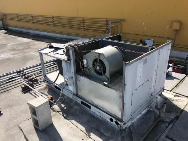 RESSAC installation team dispatched to a Pinole, CA, supplement store to replace the old Carrier package air conditioner. Crane lift removed existing system, loaded new onto platform. Reconnected, charged, and tested new unit. Working well, no issues to report.