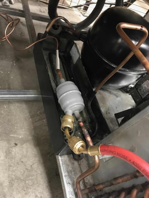 Los Angeles, CA - Our Sherman Oaks, CA, technician arrived at an import retail store to completed quoted repairs on their commercial refrigerator. The Imbera cooler needed its evaporator coil, compressor, filter drier and capillary tube replaced. After replacing parts, tech pressurized system to test for leaks. Pulled unit into vacuum and hooked up all electrical. Charged unit with new R134A refrigerant and checked operation. Watched unit cycle on and off multiple times, confirmed no more issues. Repairs complete, cooler at 40 degrees. Los Angeles, CA - Our Sherman Oaks, CA, technician arrived at an import retail store to completed quoted repairs on their commercial refrigerator. The Imbera cooler needed its evaporator coil, compressor, filter drier and capillary tube replaced. After replacing parts, tech pressurized system to test for leaks. Pulled unit into vacuum and hooked up all electrical. Charged unit with new R134A refrigerant and checked operation. Watched unit cycle on and off multiple times, confirmed no more issues. Repairs complete, cooler at 40 degrees.