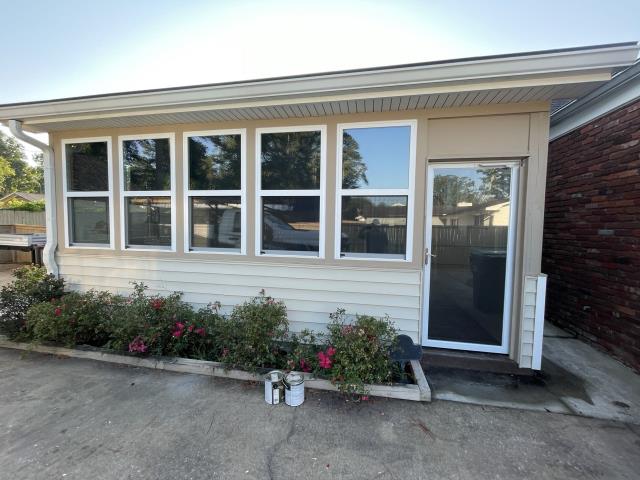 We replaced windows and siding on a house in South Fulton, Ga. 