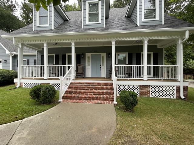 We replaced the gutters, siding, windows and deck on a house in Norcross, Ga. 