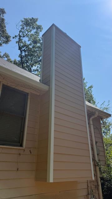 We replaced the siding on the chimney on a house in Douglasville, Ga. 