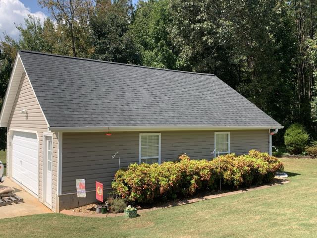 We replaced the roof on a house and a storage building in Winston, Ga. 