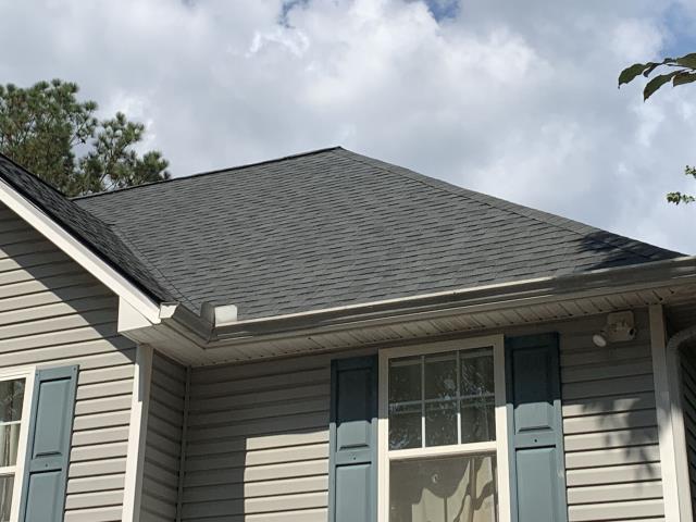 We replaced the roof and gutters on a house in Temple, Ga.