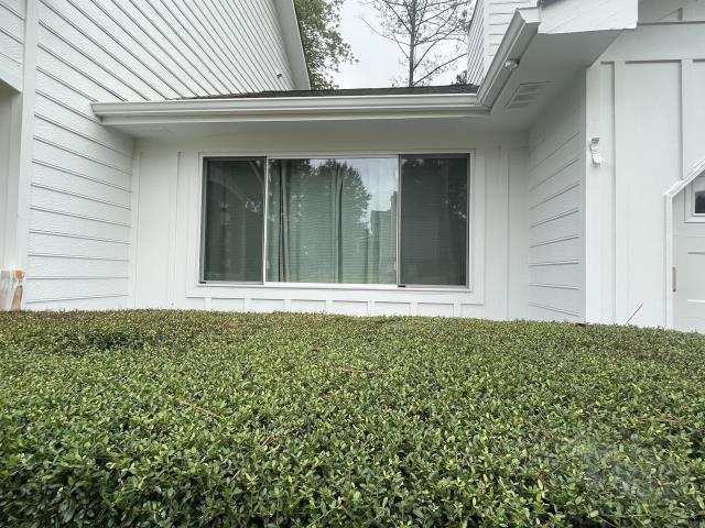 We replaced the siding, windows and deck on a house in Roswell, Ga. 