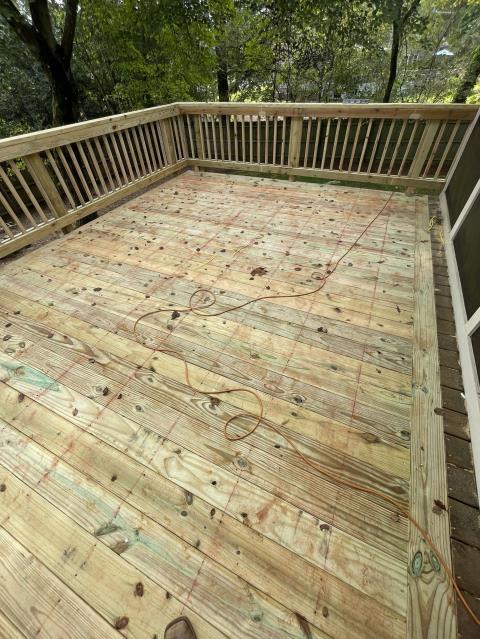 We replaced the siding, windows and deck on a house in Roswell, Ga. 